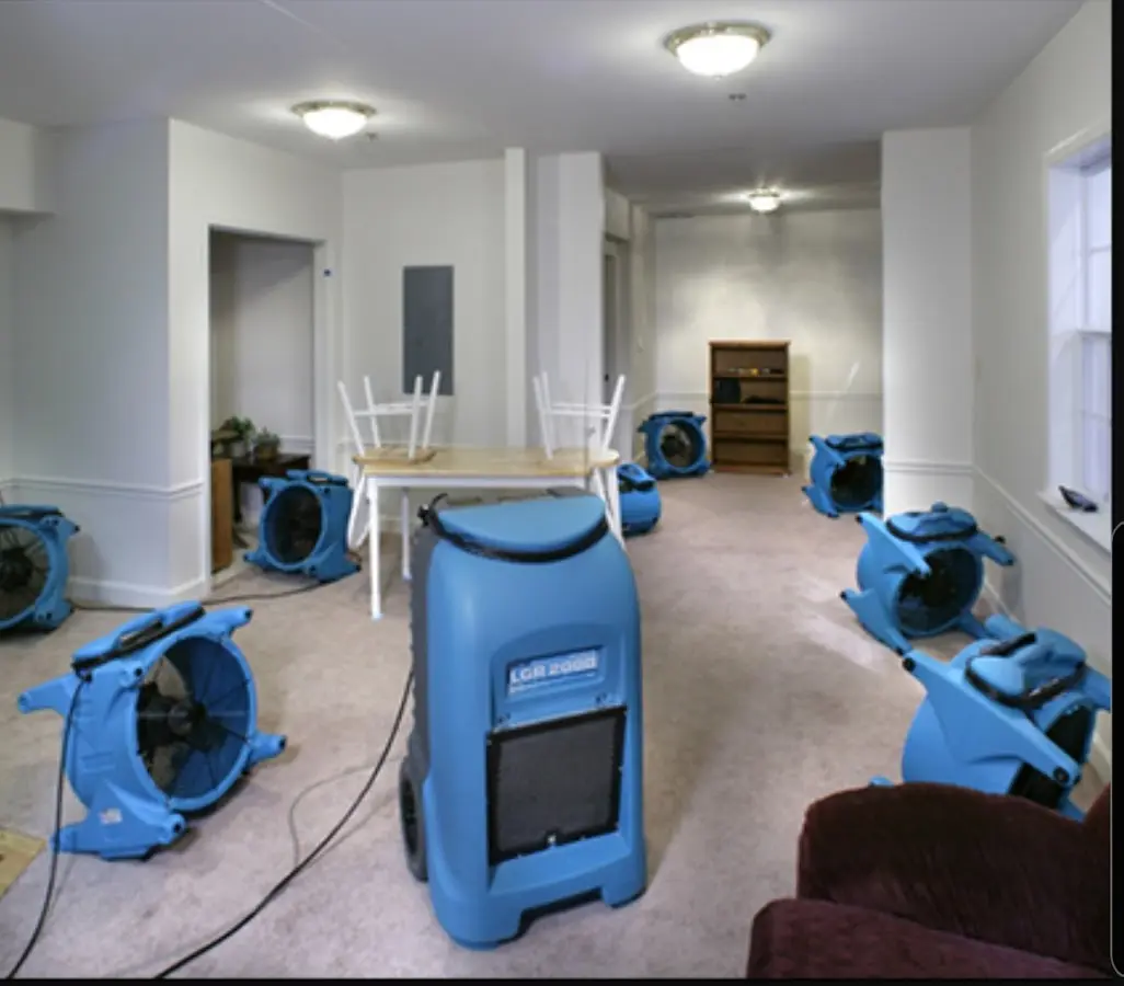 Air movers and dehumidifier setup for Water Damage Restoration in Carpinteria